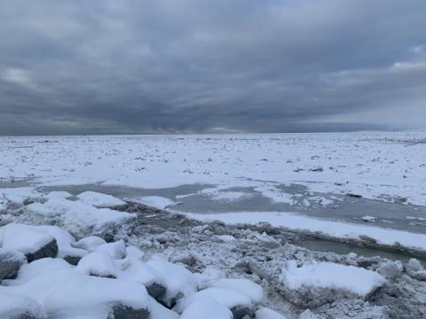 Snow piles on sea ice in the Kotzebue Sound. (Photo by Wesley Early, KOTZ – Kotzebue)